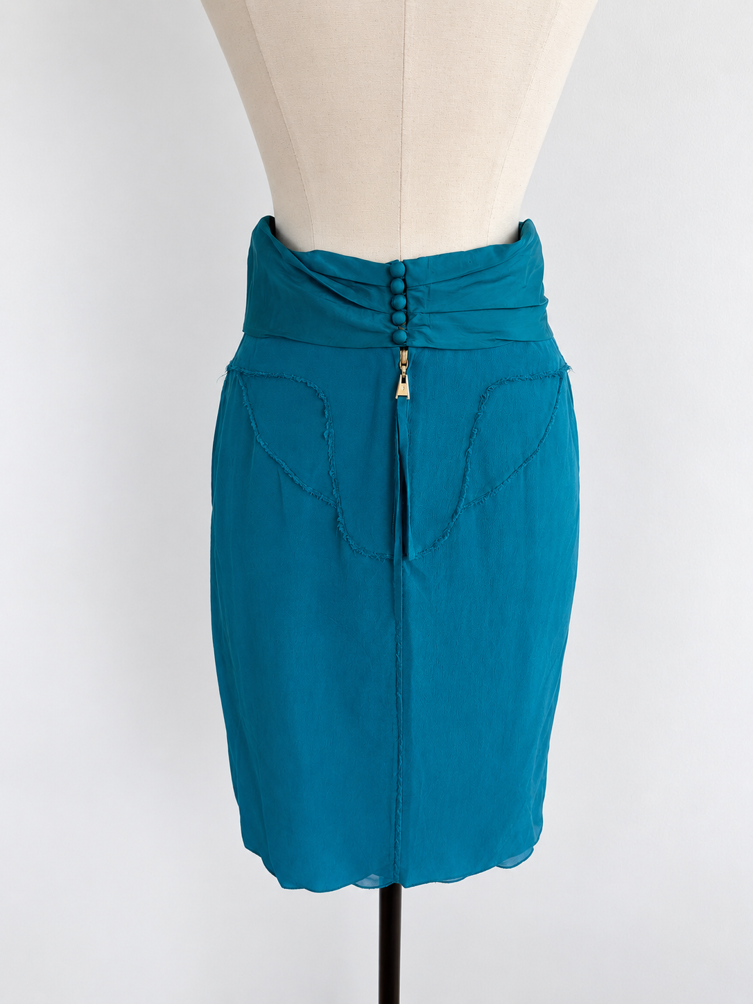 Teal skirt back detail