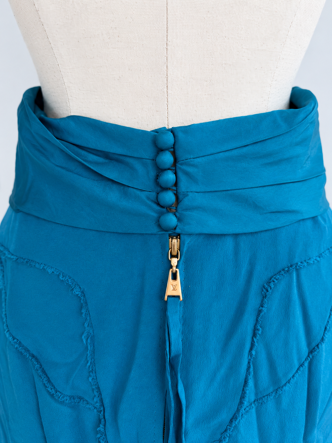 Teal skirt LV zipper waist detail