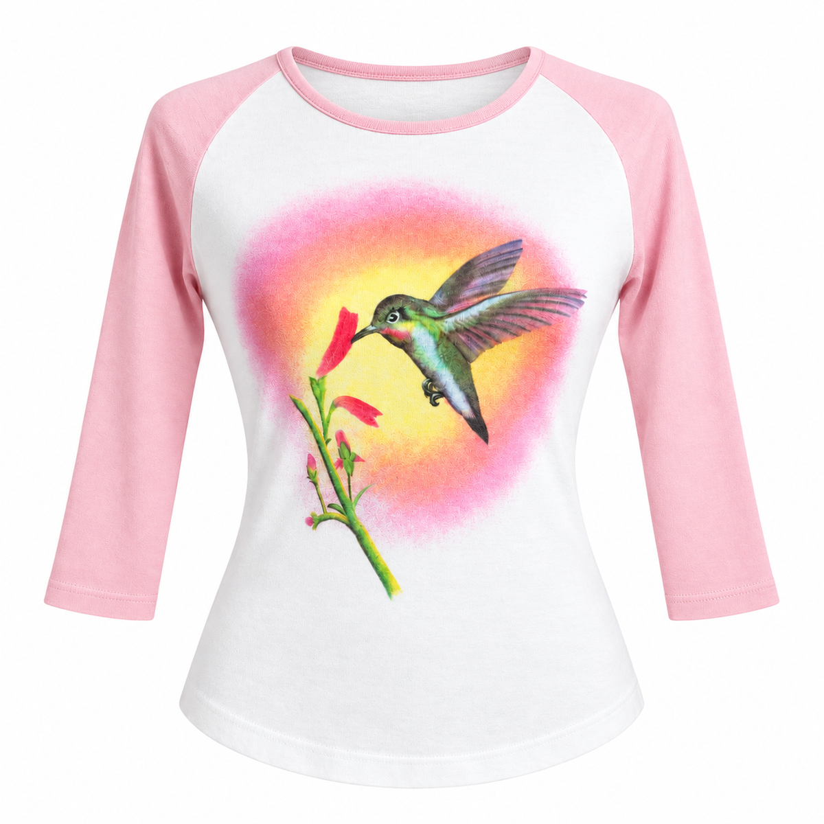 Front flat-lay — pastel pink raglan sleeves with hummingbird graphic